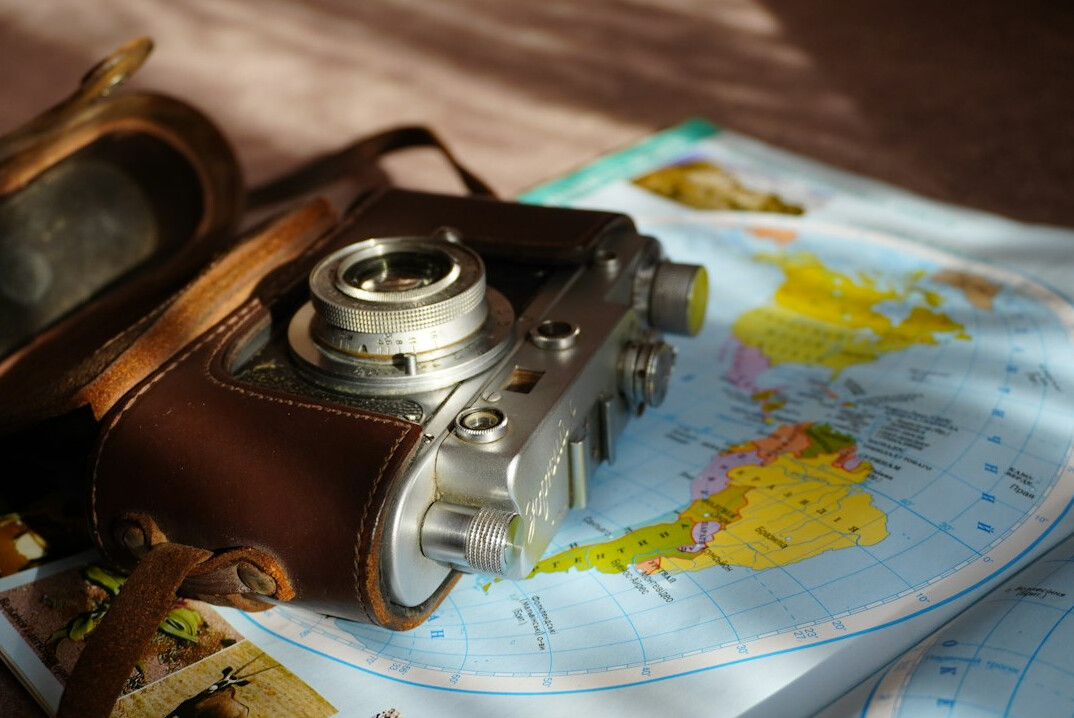 vintage magnifying glass on map