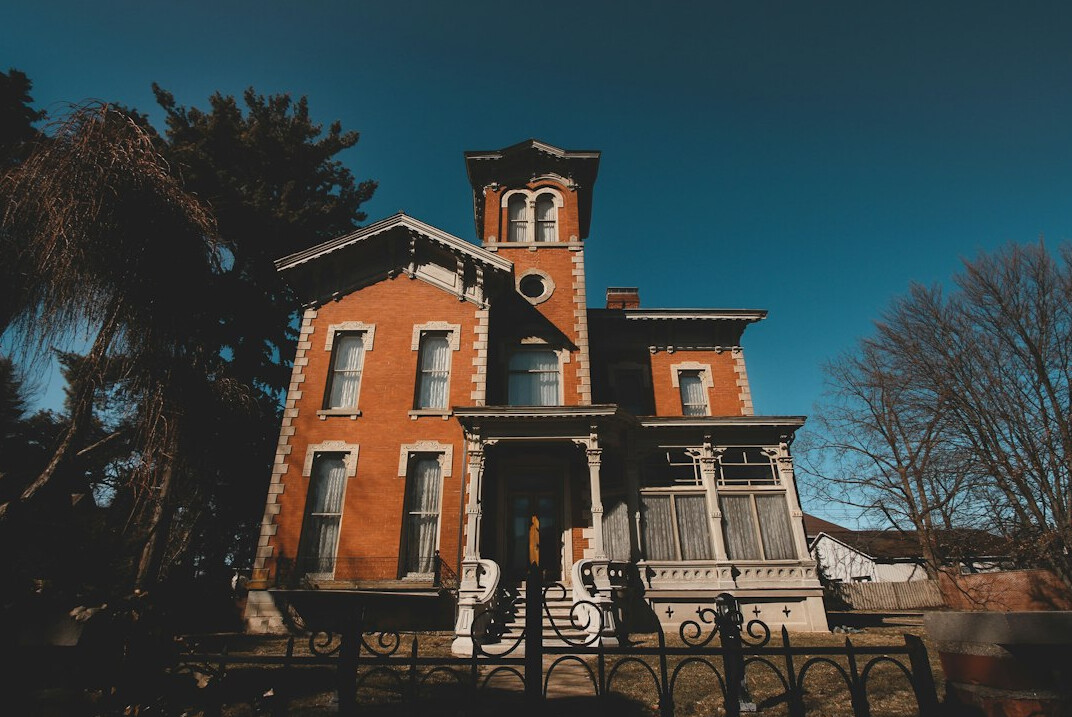 detective investigating old house